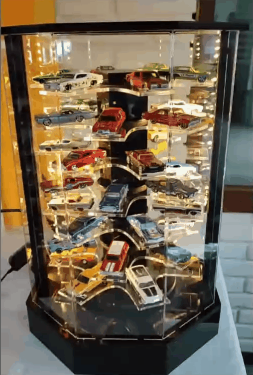 Rotating display stand accommodates 32/42 miniature models in 1:64 scale - Features lighting and motor