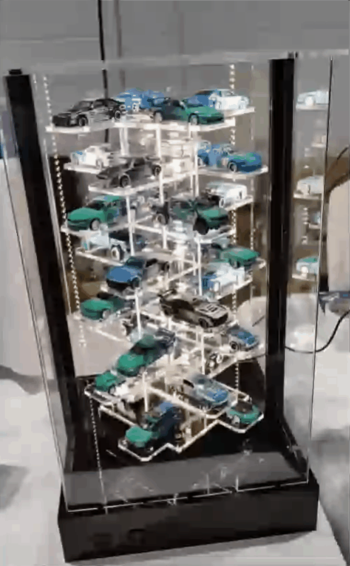 Rotating display stand accommodates 32/42 miniature models in 1:64 scale - Features lighting and motor