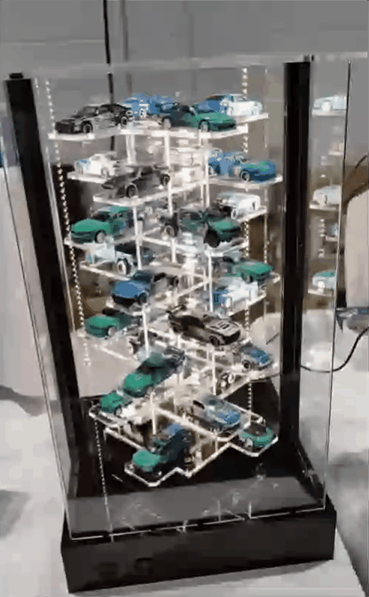 Rotating display stand accommodates 32/42 miniature models in 1:64 scale - Features lighting and motor